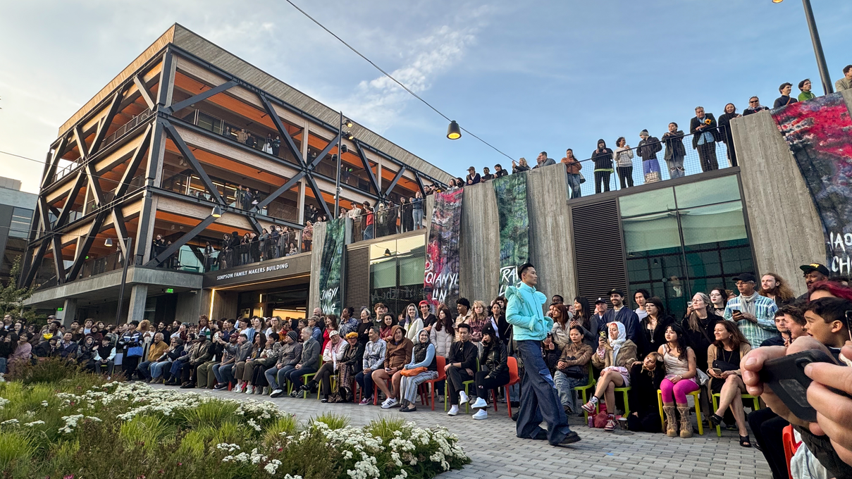 A model presents a look from the BFA Fashion Design Senior Show runway presentation in the Gensler Courtyard, Spring 2025.