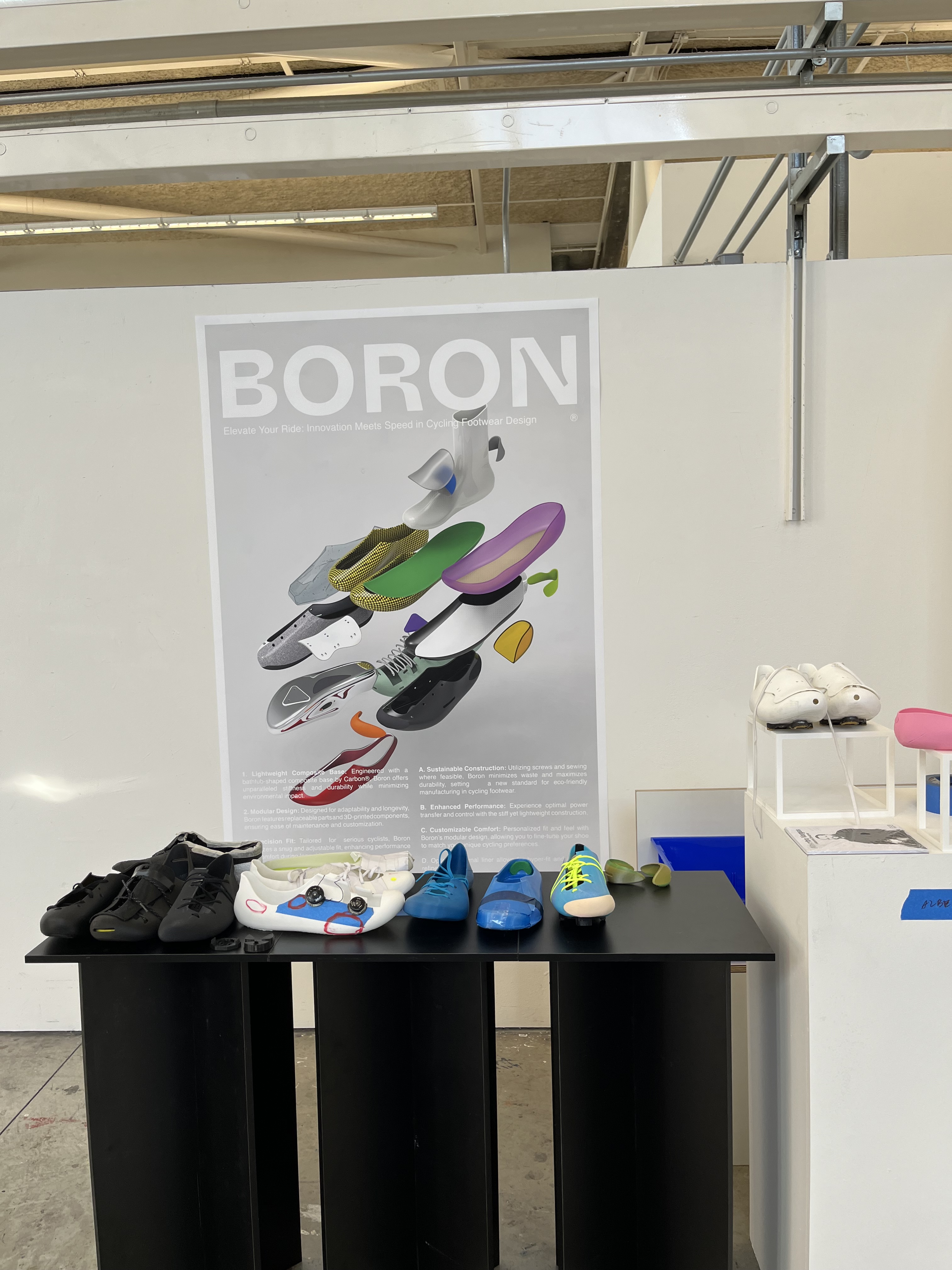 The Boron cycling shoe prototype by a BFA Industrial Design student, designed with a lightweight carbon-boron composite base and modular replaceable components for performance cyclists.