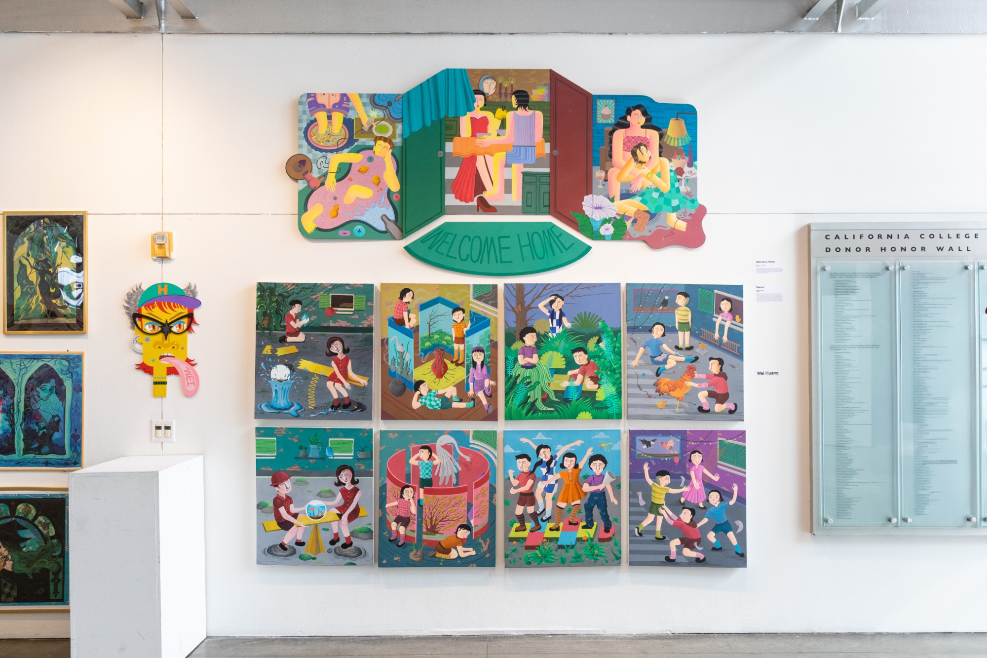 A gallery wall displays "Welcome Home," a large triptych illustration by Wei Huang, alongside a grid of narrative paintings and mixed sculptural works at the BFA Illustration Senior Show.